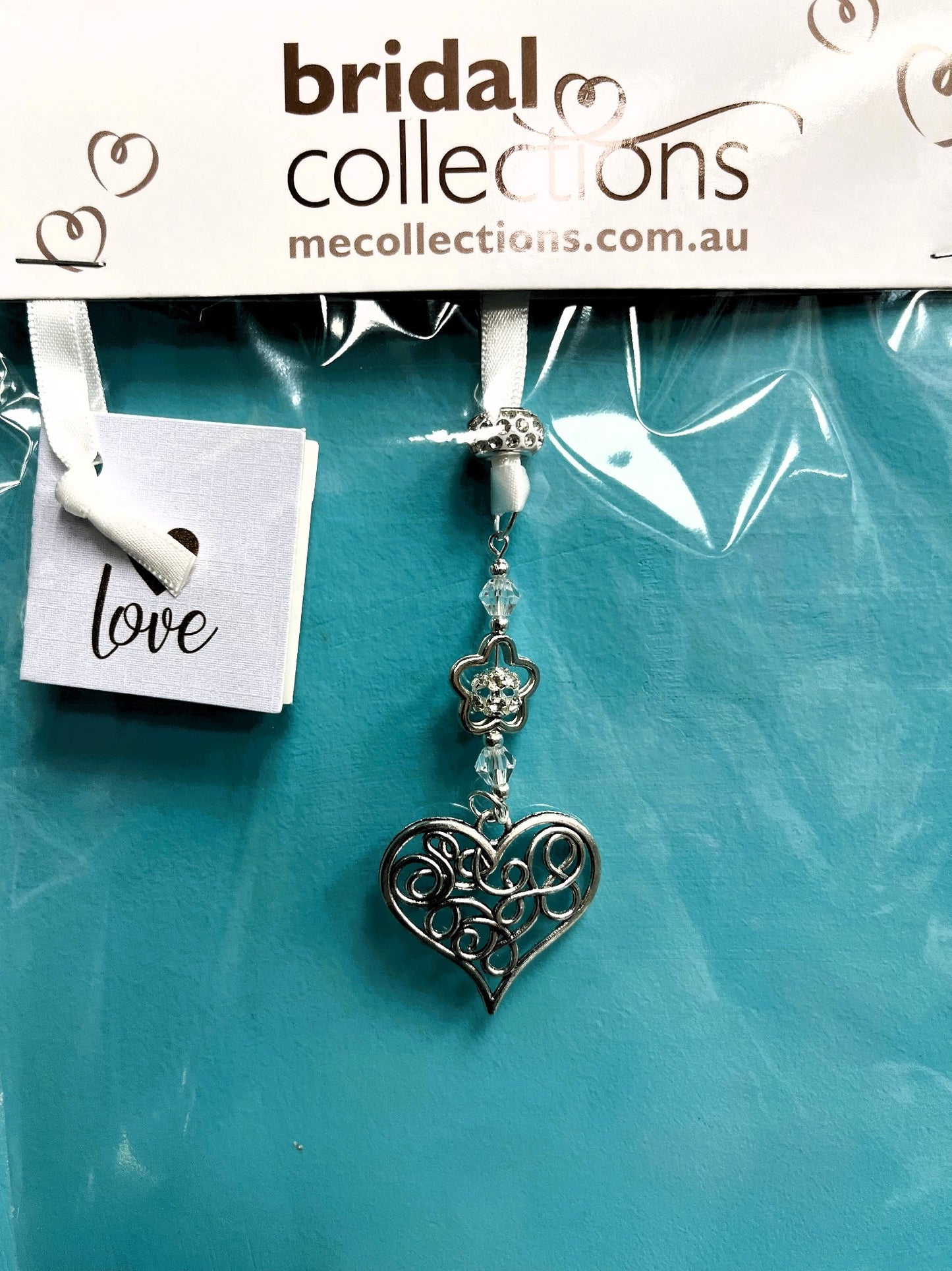SILVER HEART WITH DIAMANTE FLOWER