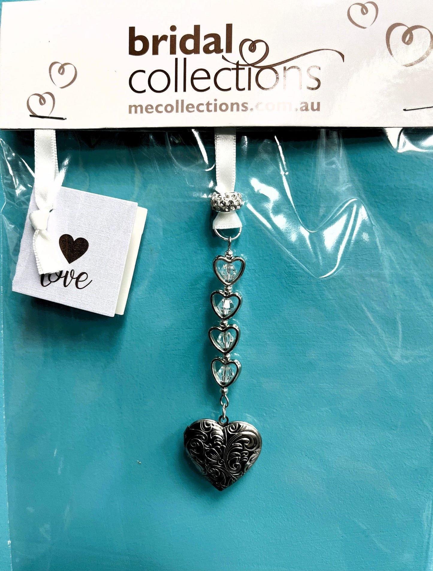 LOCKET WITH CHAIN OF HEARTS KEEPSAKE
