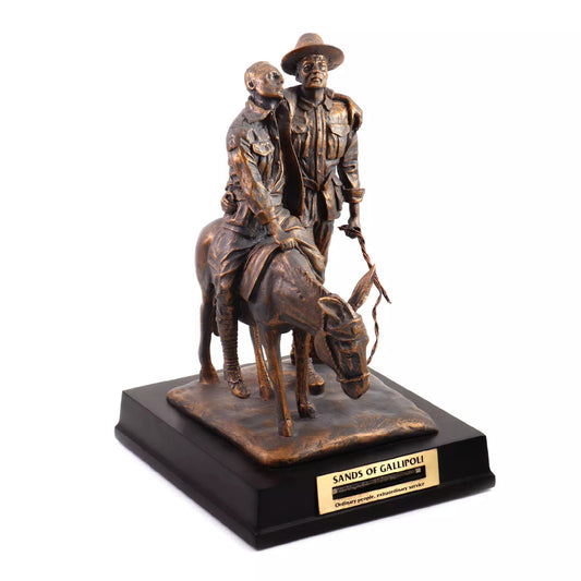 MAN WITH DONKEY FIGURINE